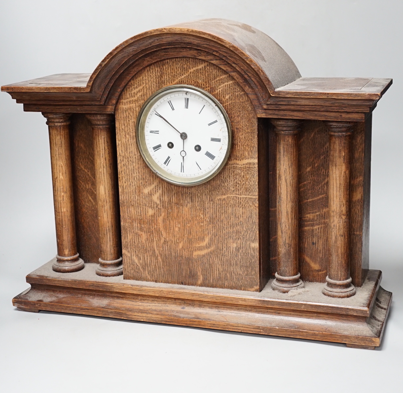 A 1920’s oak mantel clock, French gong-striking movement, 39cm high